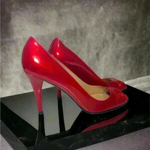 Stuart  Weitzman, candy apple red heels with peep toe, 7 1/2 narrow